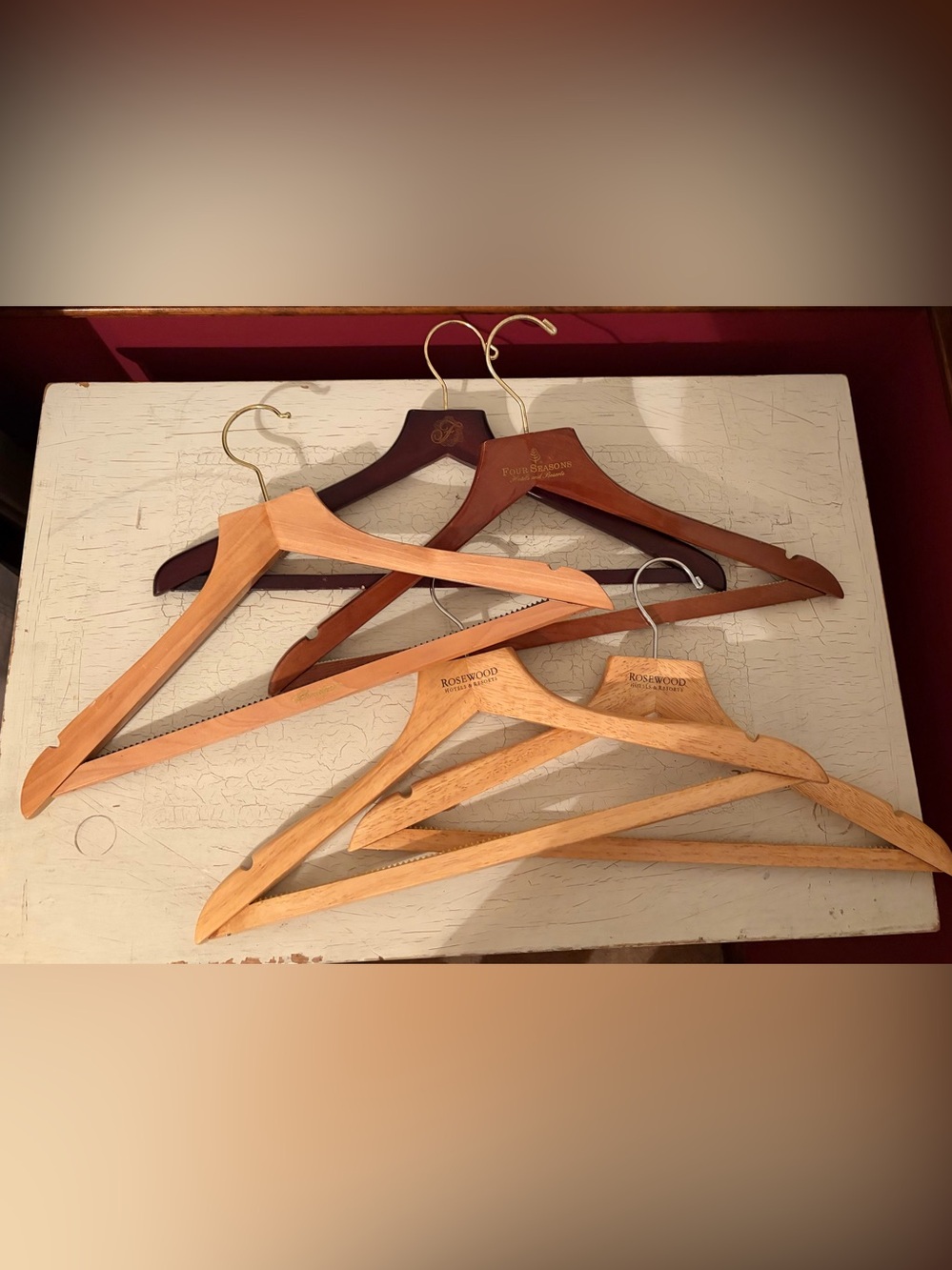 Set of 5 vintage wooden hangers. Perfect for hanging heavy suits and formals.
